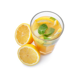 Glass of fresh cocktail with lemon on white background