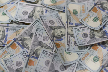 Background of one hundred dollar bills