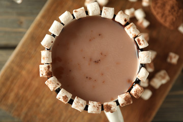 Cup of tasty cocoa with marshmallows, closeup