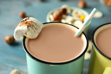 Cup of tasty cocoa with marshmallow, closeup