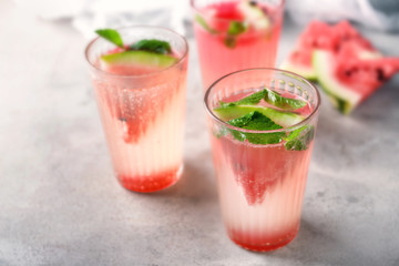 Fresh summer cocktail in glasses on light table