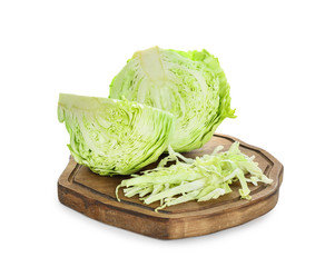 Wooden board with cut cabbage on white background