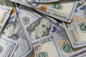 Background of one hundred dollar bills