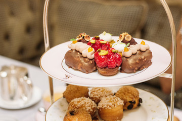 Beautiful English Afternoon Breakfast Tea Ceremony with Desserts and Snacks in Barcelona Luxury Hotel