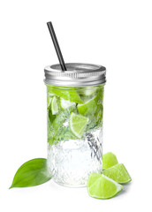 Jar of fresh lime lemonade on white background