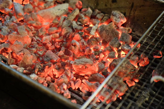Glowing hot charcoal in bbq stove