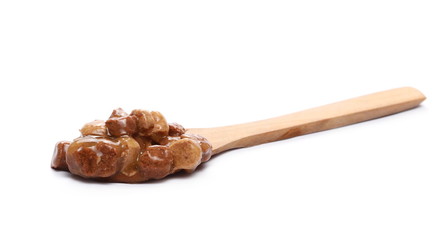 Cat food with wooden spoon isolated on white background