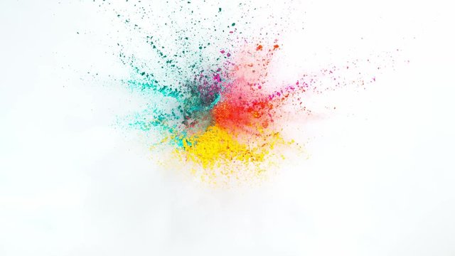 Super slow motion of coloured powder explosion isolated on white background. 1000 fps
