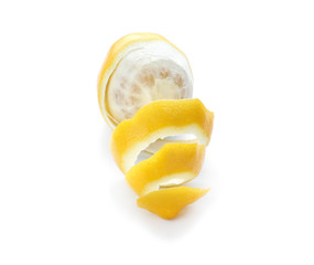 Peeled ripe lemon on white background