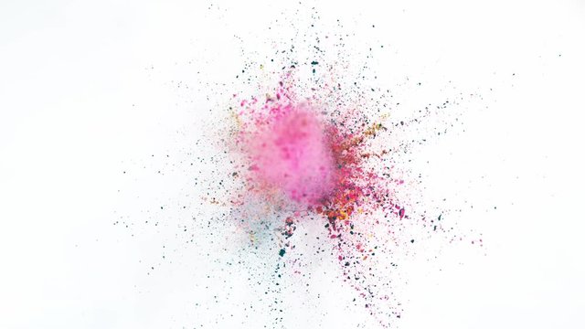 Super slow motion of coloured powder explosion isolated on white background. 1000 fps