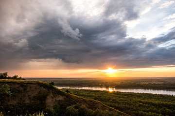 Fototapeta na wymiar landscape sunset sky over the river valley