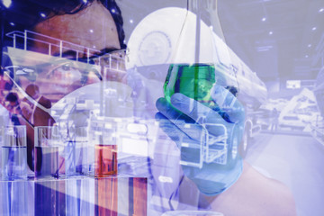 Double exposure Oil Research Scientist with oil tank, science concept.
