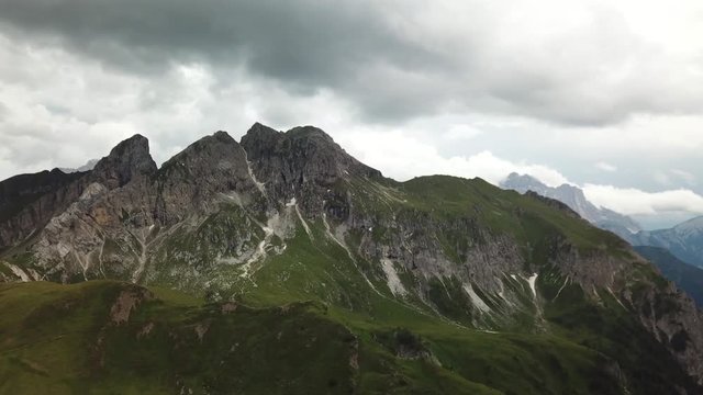 Aerial- Flying towards a mountain in the Dolomites.