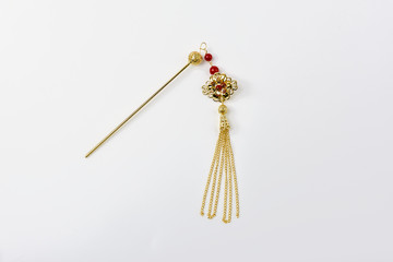 Gold hair clips in white background