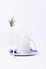 white cup of coffee