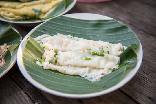 Thai food recipe name is "Khao parn pak", a egg steaming and topping with vegetable and roll with spicy sauce, This recipe from Sukhothai province at Thailand