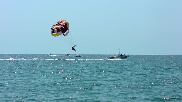 Parachute flight by boat