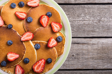 Pancakes with strawberry and blueberry