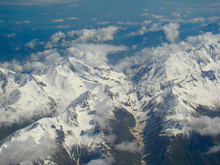 Fototapeta premium snow-capped mountains. the Caucasus Mountains. view from airplane 