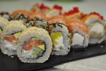 food, sushi, fish, rice, japanese, roll, meal, salmon, dinner, seafood, gourmet, japan, cuisine, maki, healthy, lunch, raw, traditional, asia, dish, fresh, white, plate, meat, snack