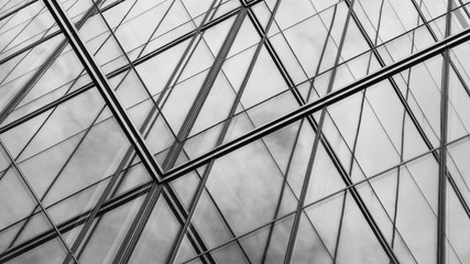 Perspective of modern glass window at skyscrapers - monochrome
