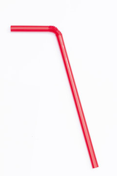 Red straw isolated on white background