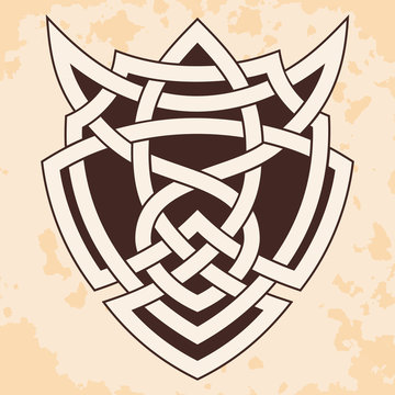Celtic national ornament interlaced ribbon on a beige background with the effect of aging. Element for graphic design and tattoo.