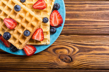 Belgian waffles with strawberry and blueberry