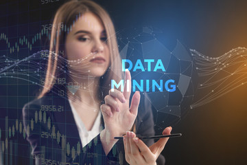The concept of business, technology, the Internet and the network. A young entrepreneur working on a virtual screen of the future and sees the inscription: Data mining