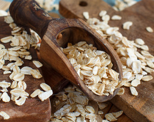 Rolled oats with a wooden spoon