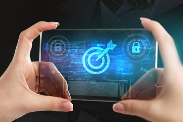 The concept of business, technology, the Internet and the network. A young entrepreneur working on...
