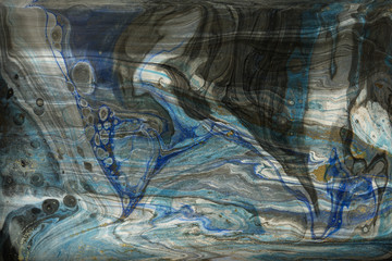 Gold and blue marbling texture design. Golden marble pattern. Fluid art.
