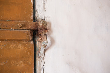 old door hinge on wooden door