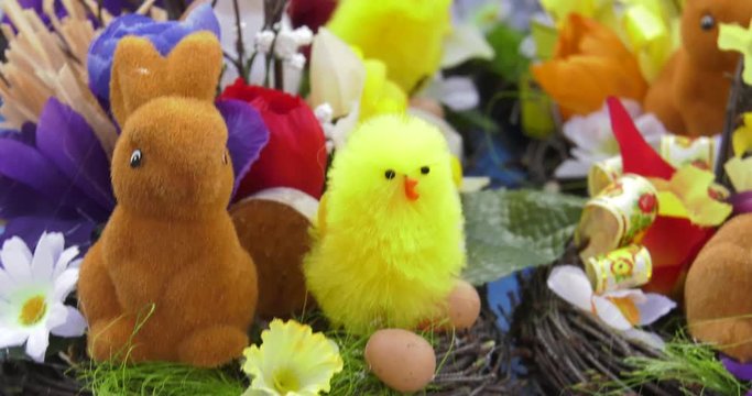 Easter decorations, flowers and animals.Panning the camera. Closeup