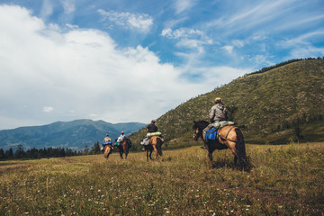 Tourists in Mountains Altai