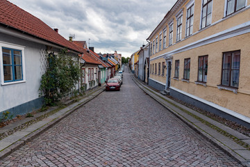 Fototapeta na wymiar old town of Mariestad with paving stones and old houses