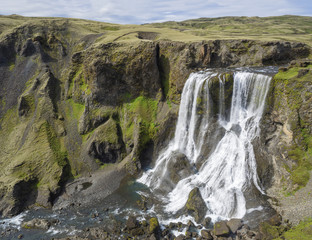 View on Beautiful Fragifoss waterfall on Geirlandsa river in South Iceland