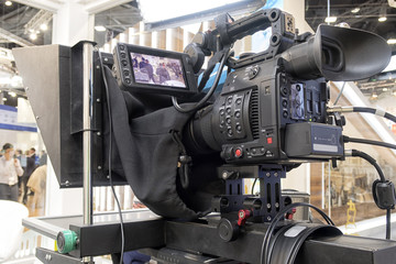Professiona tv camera in live show pavilion.