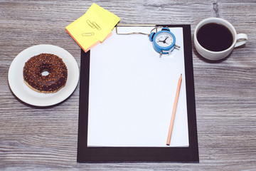 Cropped image of office accessories. Break at work, time for coffee