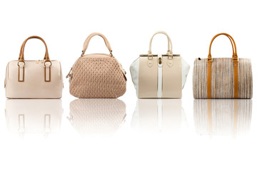 Beige handbags collection isolated on white background.Front view.
