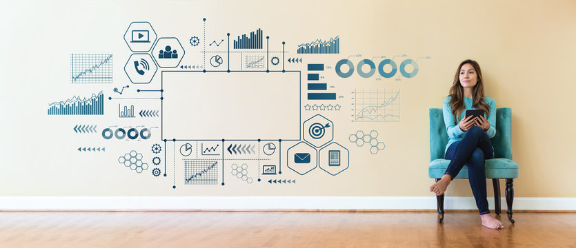 Marketing concept with young woman holding a tablet computer - Powered by Adobe