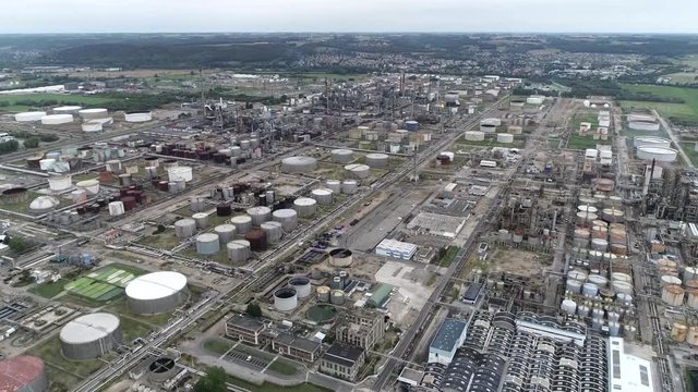 Aerial footage of petroleum refinery an industrial process plant where crude oil is transformed and refined into more useful products such as naphtha gasoline diesel fuel asphalt base and kerosene 4k