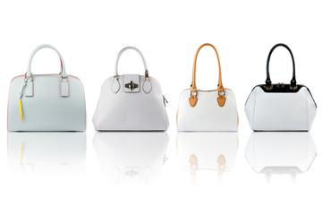Set of white handbags.Isolated on white background.Front view.


