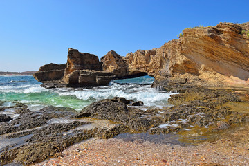 Fototapeta na wymiar sandstone cliffs at the Nahsholim beach, north of Israel
