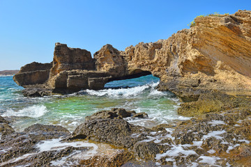 Fototapeta na wymiar sandstone cliffs at the Nahsholim beach, north of Israel
