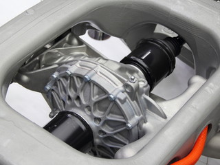 Automotive transmission parts - close up gear, driveshafts, tripod CV-joints, on subframe of new concept car gearing scheme