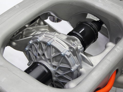 Automotive transmission parts - close up gear, driveshafts, tripod CV-joints, on subframe of new concept car gearing scheme
