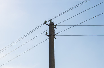 pole and wires on the sky background