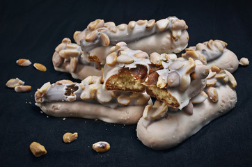 white glaze cookies with peanuts
