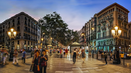 Pedestrians walking in city square